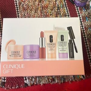 Clinique gift set, moisturizer, balm, “bare pop” lipstick, mask, soap, mascara